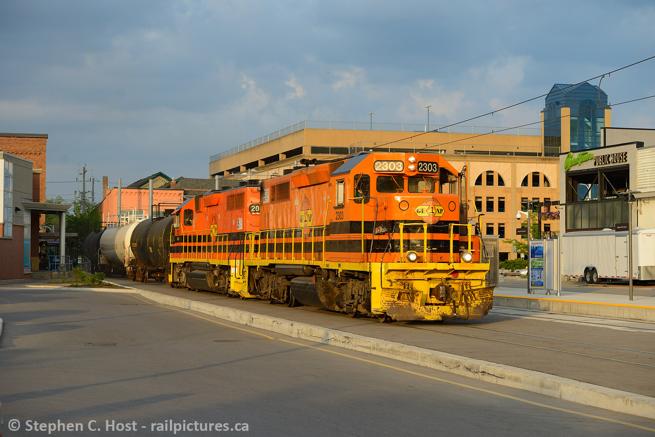 While GEXR takes over the GJR in Guelph - I thought I'd post a different GEXR image from the recent past. Here's GEXR  584 shown hitting the 'streets' of the Waterloo Public Square LRT station in downtown Waterloo - a photo that took me a dozen attempts to get with my goal to show the train going by the LRT station in daylight. They usually departed around dusk, but if lucky they would depart rather quickly after going on duty at 1900, if they departed by 1930 you'd get light on the longest summer days, for about four weeks. However, my bets are that it only happened a couple times that summer. Here's one of them.