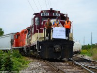 People, part deux.  The people that make the railway move the people we photograph. While we stop taking photos they are still out there making the cut, walking the train, setting brakes, sometimes in weather that make us complain and go home. They don't go home until the job's done. Here's the 1400 recrew, posed for the cameras before they began work for the day after relieving the morning job. From  Left to Right, RP.CA moderator <a href= target=_blank>Mike DaCosta</a>, Jon Snook, and Tom Domladovic. Thanks guys!