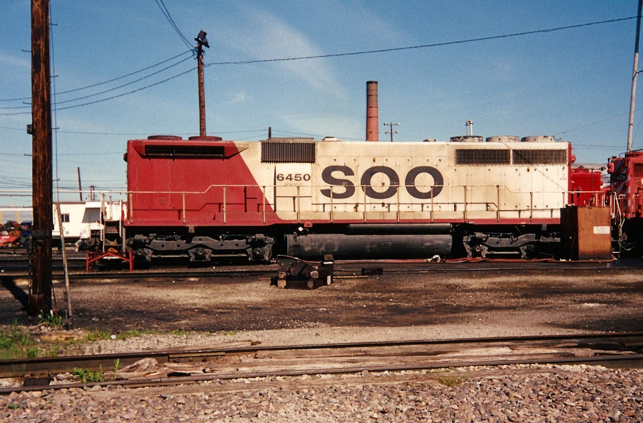 SOO Line SD40B 6450 is viewed getting serviced at Canadian Pacific's Toronto Yard between assignments. During the 1990's, this one of a kind SOO Line unit, did occasionally venture into Ontario from the US. It is ex-BN SD40B 7600 and nee-BN SD40 6302.