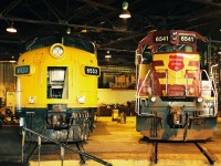 Former VIA Rail FP7A 6553 and Wisconsin Central SD45 6541 share shop space at WC's Sault Ste. Marie diesel facility as both units were in different stages of life. WC 6541 was originally built in 1971 as Burlington Northern, before becoming WC 6541, then re-numbered 7526, before ending its run as NREX 7526. FP7A 6553, which was built for Canadian Pacific in 1953 went on to become Algoma Central FP9A 1756. It was later retired and sold to the West Coast Railway Association in Squamish, British Columbia. 
