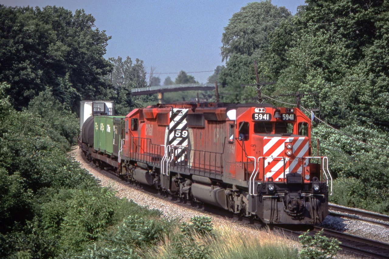 CP 5941 has left Toronto and is approaching Bayview Junction, Ontario on June 29, 1981.