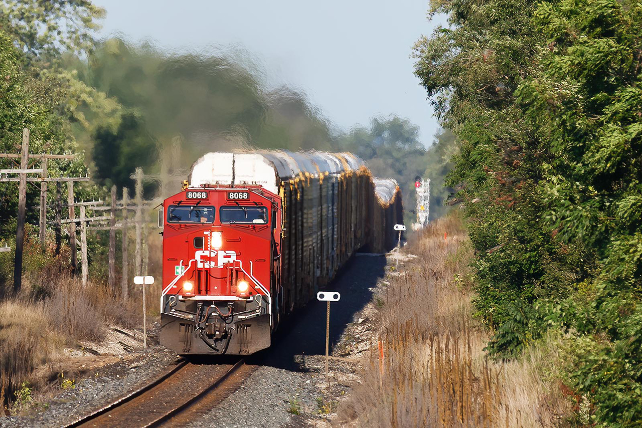 the shady side of 147 shows the track profile east of Cambridge....the 9000 foot train really helping show all the humps.