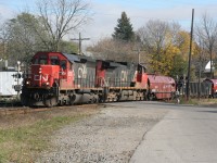 A CN westbound curves through Paris with CN SD40-2 6016 and IC 2711 on November 1, 2008. 