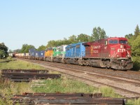 A westbound CP mixed freight rolls through Ayr with a rainbow of leasers on August 30, 2008. 
