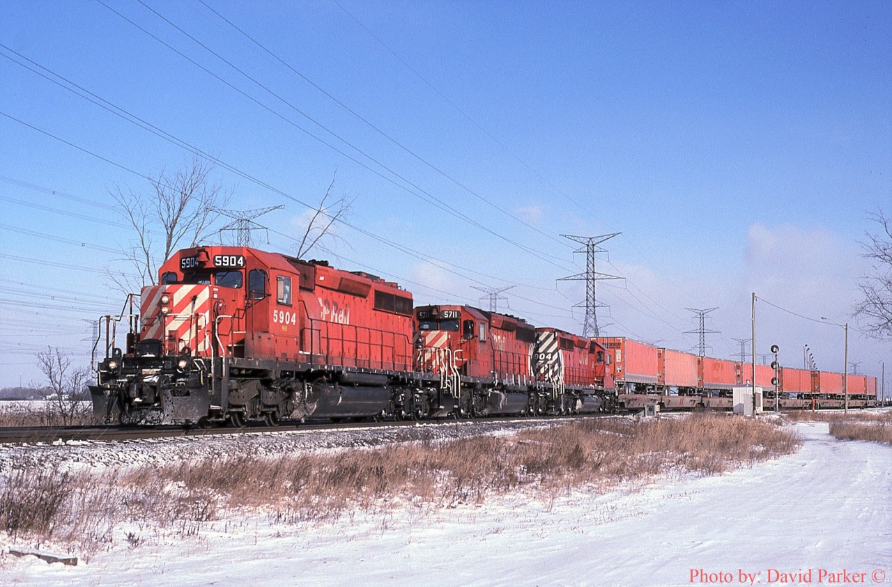 A trio of SD40-2's (5904-5711-6004) is on the pull out of the Expressway Terminal at Hornby with train No 123 for Detroit.