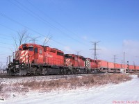  A trio of SD40-2's (5904-5711-6004) is on the pull out of the Expressway Terminal at Hornby with train No 123 for Detroit. 