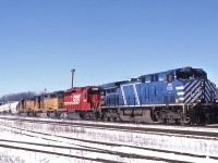  A colourful consist of CEFX1019-SOO6602-CEFX2790-CEFX2813 brings CP No 244 through Guelph Jct on a sunny January day, which Im sure was alot colder than it appears. 