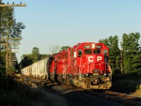 CP T69 makes its westbound trip towards London in the evening with Ex-D&H CP 7307 leading CP 3134 and CP 2242. Just about the enter shadows that continue for the next half mile, T69 wastes no time flying past the Blandford siding. Seeing 7307 lead was a nice treat, even if it is in candy apple red and not the D&H