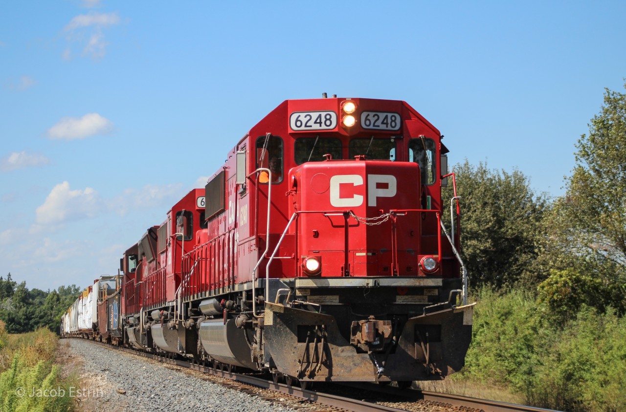 CP 6248 leads 254 down the Hamilton with a Full EMD Lashup, Two SD60's and a SD30-ECO!