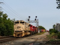 CP 421-15 powers up after briefly holding for a GO train to clear the Davenport diamond before continuing its journey westbound through Toronto towards the CP Mactier sub. CP 421 had an extra special consist, with CP 7021 leading CP SD60M 6259 and ES44AC 9359. Although it looks like I got a bit screwed by the clouds, this photo was actually taken on a sunny day. The reason for the "dimmed" light, is the smoke from the west coast wildfires had blown across the continent and made it's way to Ontario. Luckily, the smoke was high enough in the atmosphere to not affect the air quality, but it is both fascinating and worrying how much it can affect the amount of  sunlight that reaches us.
