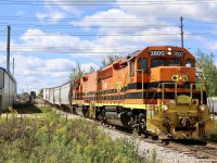 Quebec Gatineau GP40-3 3800 has a long history, beginning its career with the Rock Island as number 343. It would later spend time on the Mo-Pac, UP, and IW before going to Helm Leasing. From there it would go to TFM in Mexico before being picked up by the QGRY. As for slug 800 it is a former B&O/CSX unit. After a few delays earlier in the week Goderich Exeter's Guelph Junction Railway is slowly getting back to what was business as usual for the OSR. After dropping a long cut of cars at the interchange the two units are off to switch Traxside on one of the Guelph North spurs.