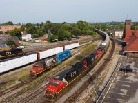 CN 435 arrives into Brantford with CN 2585 CN 5787 and CN 2417.  I had been initially hoping for 2417 to be leading but the scene panned out nicely with CN 4726, GMTX 2323 and CN 2675 sitting in the yard as 435 passed.  DJI Mavic Mini used for the photo.