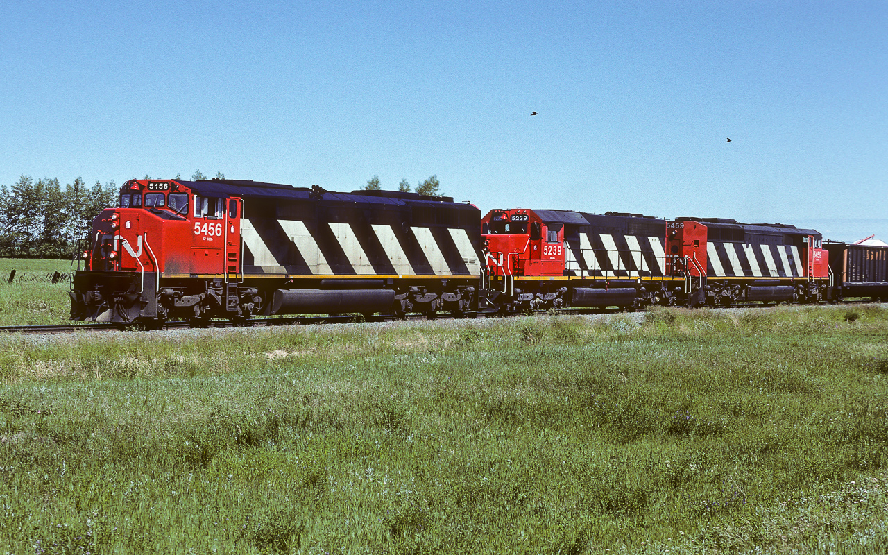 Unit train traveling south at mile 89 of the Camrose Sub. With only 5 miles left to Mirror yard, the crew will be anticipating a short rest before heading back home to Edmonton.