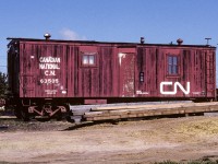 A work train was parked on the Redwater elevator track for a couple weeks in 1987. Rehab work was being done on the track north of town. Couldn't resist taking a photo of this old box converted to a Heat and Office Supply car. The heat part makes sense with the neighbouring bunk cars, the office supply leaves me scratching my head. Maybe there is a lot of paper work to do when upgrading track. It's the upright brake wheel that gets a 10 out of 10 on my list. :-)