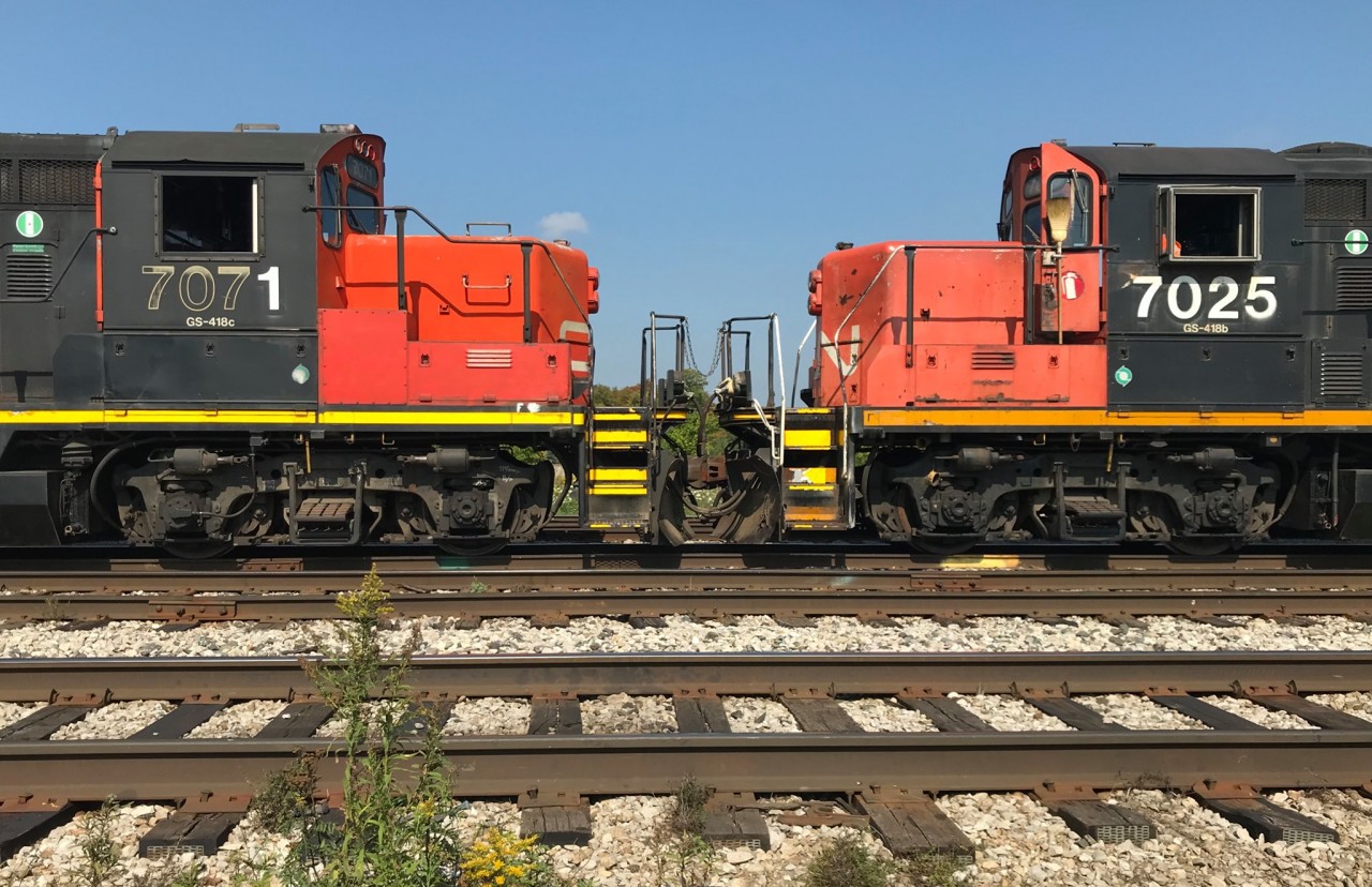 The classy duo of CN GP9RM’s 7071 and 7025 are viewed cab-to-cab as L540 switches the east end of the yard in Kitchener, Ontario on the Guelph Subdivision. September 21, 2019.