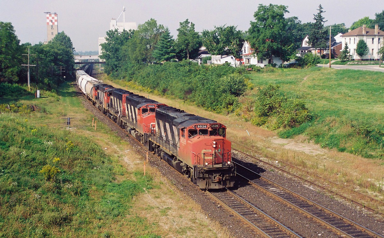Twenty-four years ago, CN 392 makes it's way through through Woodstock on the CN Dundas Subdivision with 9526, 9576, 9448 and 9643. At the time, this train operated from Sarnia to MacMillan Yard in Toronto.