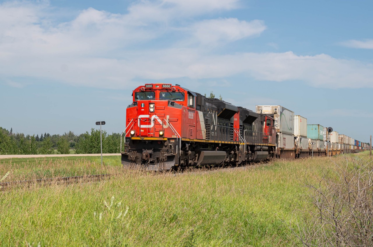 CN 8886 and 8836 rumble south past the Rahr Malting plant in Alix. This is my first post on RP.ca and hopefully there are many more to come.