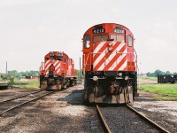 CP C424 4212 and RS18u 1836 were the assigned power for the locals based out of the Smiths Falls, Ontario yard during a hazy summer afternoon. MLW 1836 was eventually converted to CP Control Cab 1117 while 4212 was later sold to the Quebec Gatineau Railway (QGRY). 