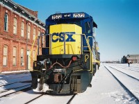 By early 1994, the Railway Capital of Canada was a far cry from its former glory days, however compared to today St. Thomas was still actually an active city as far as being served by different railroads. Long gone were the days of Conrail, Chessie and any passenger trains, however CSX, NS, CN and CP trains still converged on the city. CSX was still operating across the CASO Subdivision, however not for much longer, while NS still ran dedicated auto parts trains on the Cayuga and Paynes Subdivisions, although that window was shortly closing too. In nearby Talbotville, CN served the huge Ford assembly plant and had a large yard with several assignments based, including serving industries on the Cayuga Subdivision. Also, CP came into the city regularly on their St. Thomas Subdivision. 
<br>
Here on an incredibly cold but sunny winter afternoon, CSX 7572 and 7756 are viewed idling beside the historic Canada Southern Railway station. This power was likely off CSX R320, which would tie-down here and not continue to Buffalo. Eventually it would become R321 simply departing St Thomas then it would ‘cab hop’ to Fargo, where it would lift all the traffic off the North end and continue to Windsor and Detroit.