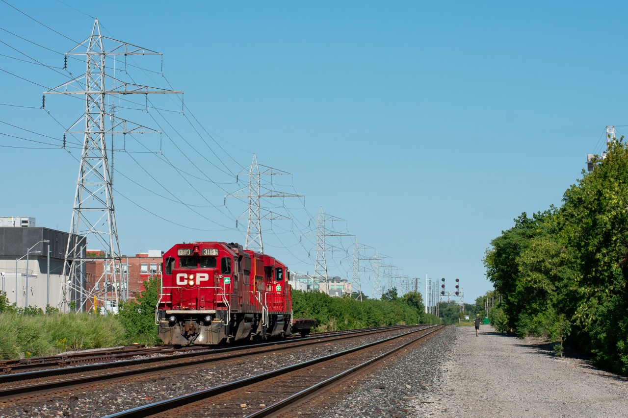 An interesting occurrence on the last day of August; the Lambton Yard power went over to Hillcrest TTC and spotted a singular flat car which had been left on the siding track at some point recently. Even the crew was confused as to why they were sticking a single empty flatcar into the TTC streetcar delivery area, as I heard over the scanner. Usually, the Lambton power will come here either with a streetcar on top of 3 flat cars for unloading, or 3 empty flatcars for TTC to load a streetcar on to, running as T66. Today however it was light power there and back to move a flatcar about 25 feet. Definitely a weird sight but cool one nonetheless.
