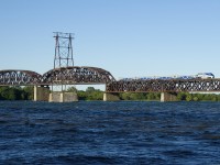 EXO 76 crosses over the choppy waters of the St. Lawrence River as it approaches its next stop at Lasalle Station.