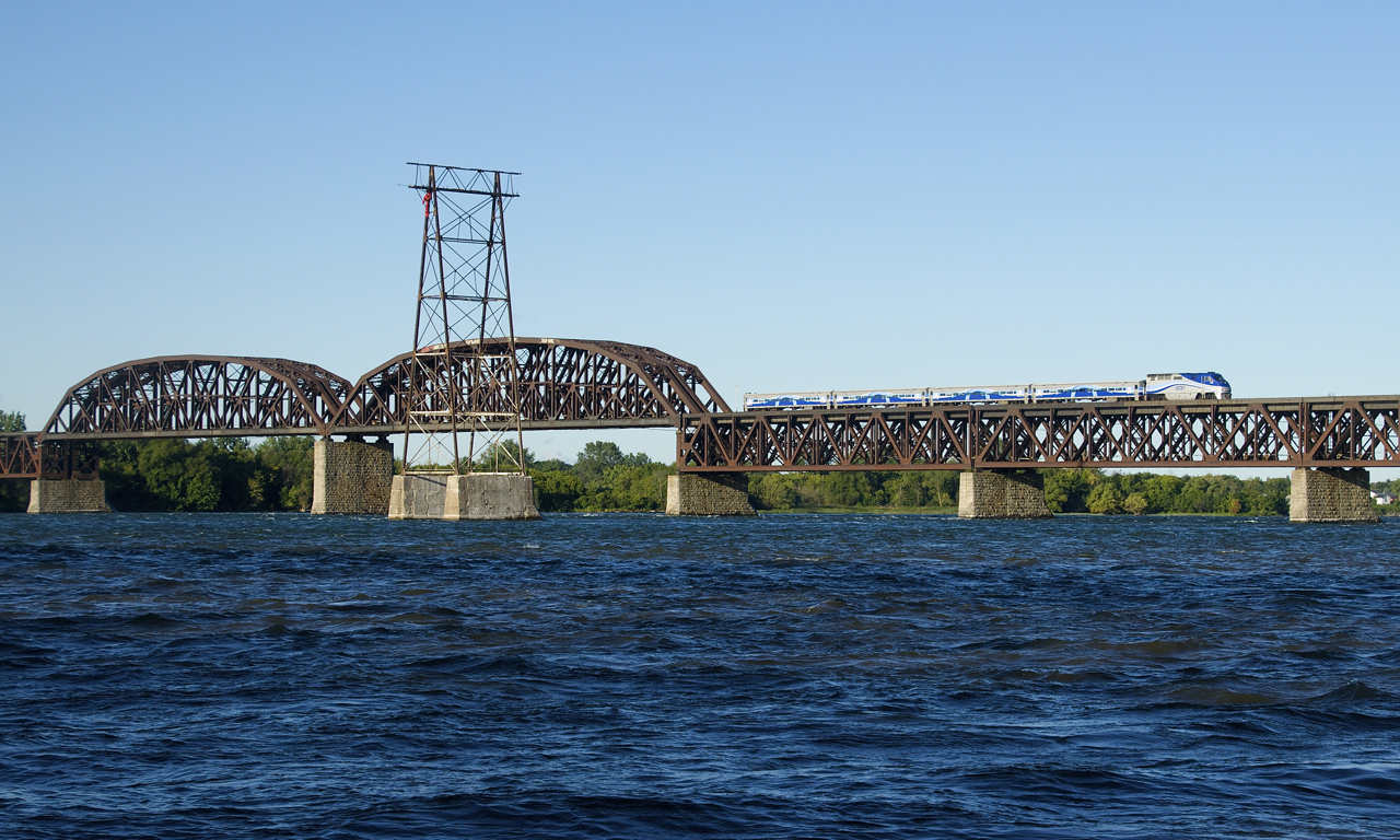 EXO 76 crosses over the choppy waters of the St. Lawrence River as it approaches its next stop at Lasalle Station.