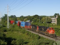 CN 8829 & CN 2164 lead CN X108 through Pointe-Claire. 