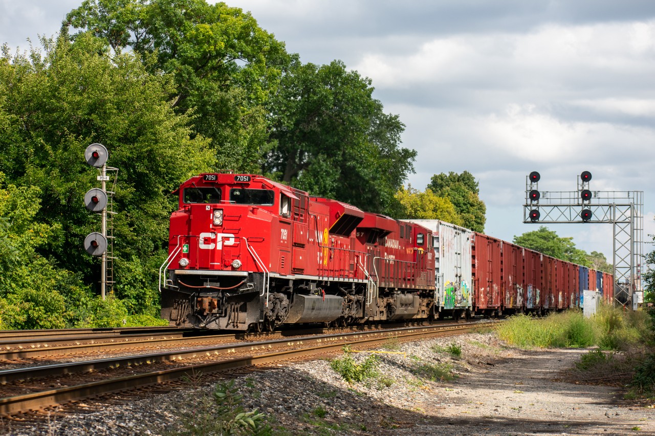 CP 651 makes a rare lift of about 30 cars of manifest at Lambton Yard on a sunny Thursday afternoon. Seeing as 651 usually makes night appearances on the North Toronto / Galt, it was pretty cool to see one with a great leader make a daylight appearance. Huge kudos as well to the crew for the complimentary waters, keep it real guys!

Taken at mile 7 Galt Sub (Scarlett Rd. Control Point).