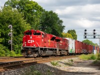 CP 651 makes a rare lift of about 30 cars of manifest at Lambton Yard on a sunny Thursday afternoon. Seeing as 651 usually makes night appearances on the North Toronto / Galt, it was pretty cool to see one with a great leader make a daylight appearance. Huge kudos as well to the crew for the complimentary waters, keep it real guys!

Taken at mile 7 Galt Sub (Scarlett Rd. Control Point).