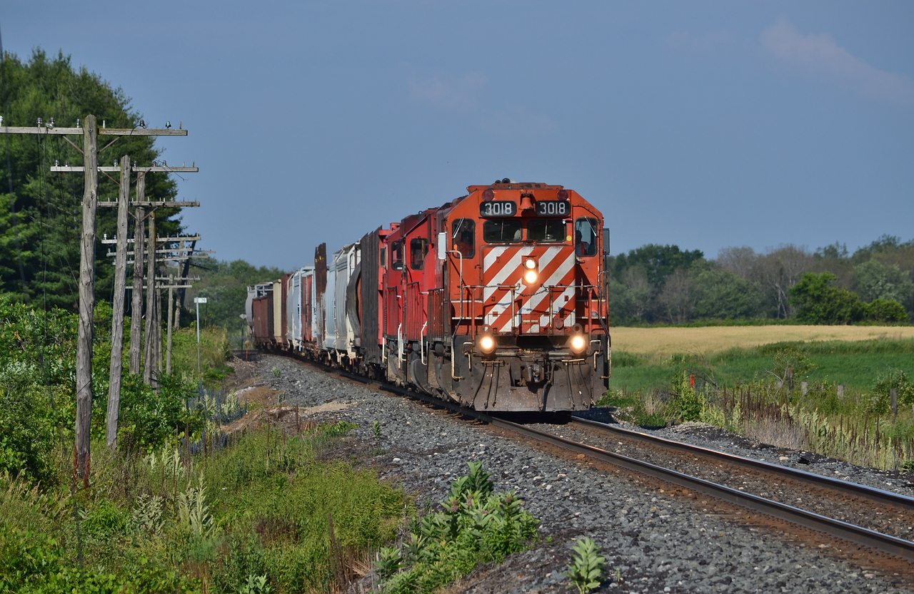 3018 is wasting zero time working back towards London, however, having to meet another Eastbound in the siding at Innerkip and work Woodstock still, the day is far from done. 3018 has been sitting in Toronto since the end of July, hopefully it will be sent out on a local in Southern Ontario again at some point.