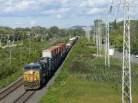 CN 327 with intermodal up front approaches MP 14 of CN's Kingston Sub with CSXT 5501 & CSXT 292 for power after holding at Dorval for CN 321, CN 377 and CN 322.