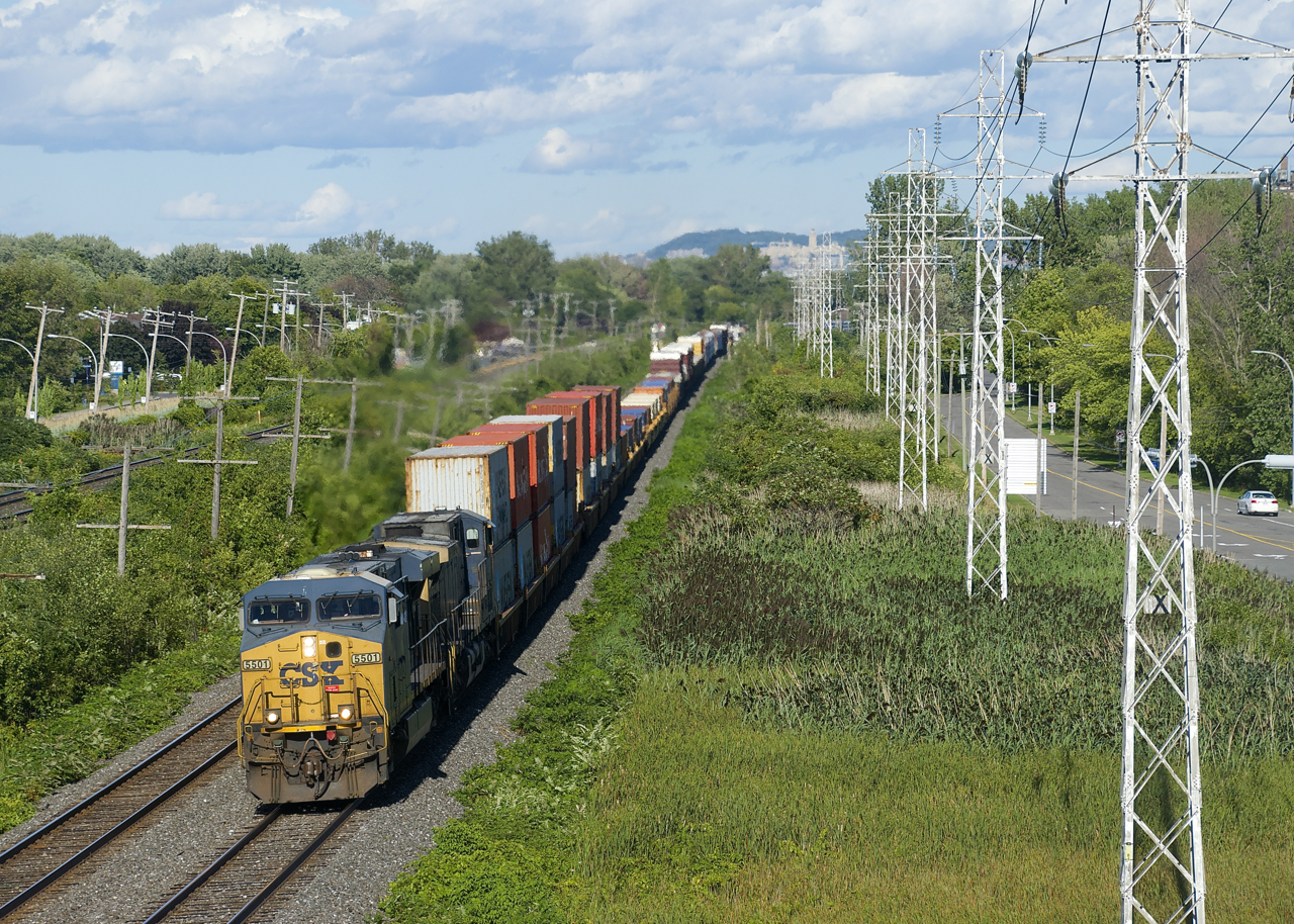CN 327 with intermodal up front approaches MP 14 of CN's Kingston Sub with CSXT 5501 & CSXT 292 for power after holding at Dorval for CN 321, CN 377 and CN 322.