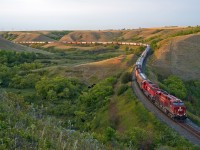 CP 8911 and 6246 are down to a walking pace as they ascend the heavy grade at Craven in the final rays of daylight.  