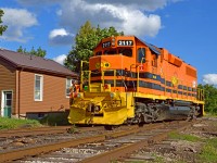 Just your neighbourhood yard job.  Residents of 'The Ward' are used to rolling steel and friendly crews for neighbours.  Trains have passed through, worked in, and been based out of St. Patrick's Ward since the Guelph Junction Railway laid track in 1888, and with OSR moving out last week, GEXR has moved in.  GEXR 583 (ordered 1400) has arrived in Guelph after switching out cars at Arkell and is seen heading around the south leg of the "Downtown wye" (Alice Street wye to some crews) to runaround a cut of cars on the main destined for Lower Yard 2, and the CN interchange tomorrow on <a href=http://www.railpictures.ca/?attachment_id=42663>GEXR 582</a> (ordered 0800).  Up until 1976 or so, this area was the base of operations for the CP Guelph yard switcher.  An <a href=http://www.trainweb.org/oldtimetrains/CPR_London/6301b.jpg>0-6-0 switcher</a> during the steam days, and often an <a href=http://www.trainweb.org/oldtimetrains/CPR_London/6538.jpg>MLW S-3</a> in later years, were based out of the Alice Street <a href=http://www.trainweb.org/oldtimetrains/CPR_London/Guelph_enginehouse.jpg>engine shed</a> located roughly where the large bush is seen beyond the 2117 above.  After demolition, the yard switcher was based out of a former team track located in the yard downtown.<br><br><a href=https://www.guelphhistoricalsociety.ca/publications/historic-guelph/volume-51/meeting-place-ward-1-guelph>St. Patrick's Ward</a> has always been host to industry and small businesses along with it's residential sector.  The large Italian immigrant community created shops providing anything people could need right in their own back yard; butcher shops and grocers, barber shops, mechanics garages, schools, and Sacred Heart Church.  Numerous industries built factories in the area around 1900 as a number of their workers would come from the Ward.  Some of these included <a href=https://www.guelphhistoricalsociety.ca/files/historic-guelph-aerial-photo-v51p8.png>Harding Yarns,</a> <a href=s3.amazonaws.com/omeka-net/6843/archive/files/ef016327efe16c8286344b2503cf7ac6.jpg?AWSAccessKeyId=AKIAI3ATG3OSQLO5HGKA&Expires=1600300800&Signature=ZNHpy7coNp%2FVCYCL5O37ZCcLskE%3D>Taylor-Forbes Manufacturing Co,</a> (later W.C. Woods), IMICO; the <a href=https://www.guelphhistoricalsociety.ca/files/historic-guelph-imico-v51p13.png>International Malleable Iron Co.</a> (note stock cars behind in siding - today's GJR Lower Yard), and the famed <a href=guelphhistoricalsociety.ca/publications/historic-guelph/volume-47/biltmore-hats-a-brief-history>Biltmore Hats.</a>  To the right, out of frame beside 2117 is the former <a href=https://guelph.pastperfectonline.com/photo/2F659618-4A16-4B73-9EDA-340382228439>Northern (later Dominion) Rubber Company building,</a> (see this link for view of tracks - 1948) now in the midst of condo redevelopment like much of the former industrial neighbourhood.