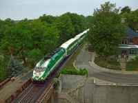 The final eastbound GO train of the morning breaks the silence in Guelph as it slows for it's station stop.