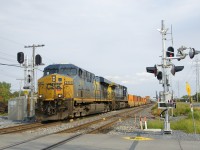 CN 327 with CSXT 5414 & CSXT 451 for power is splitting a pair of intermediate signals at MP 14.7 of CN's Kingson Sub which just entered service during the last couple of weeks. 