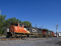 CN 369 with CN 5627 & CN 2147 for power is passing the Perrot Boulevard crossing.