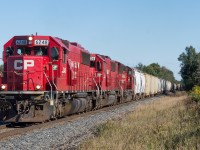 CP 255 is lead towards Concession 6 Side Road in Waterdown by the much photographed of late EMD trio.  With 9000' on the drawbar this was a heavy and long train so the EMD's put on quite the show.  A nice sunny fall afternoon made this shot well worth the drive.  Thanks for the motivation, Rob.