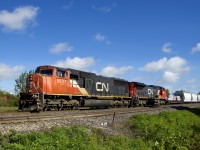CN 369 with CN 5627 & CN 2147 for power is passing MP 35 of CN's Kingston Sub.