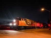 After patiently waiting at the connecting track for instructions from West Tower as well as a signal from CP RTC, CN 549 crawls through the Old Weston Road crossing at the foot of the CP MacTier Sub with 3 classic geeps handling the job with ease. They were long enough to require a light past the Davenport Diamond before shoving back and beginning their work in Lambton Yard. It sure would have been quite the sight from the diamond for sure seeing engines from the railroad that formerly owned that portion of the Newmarket Sub cross on an opposing railroad's trackage.