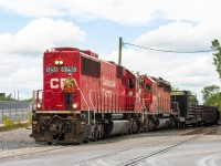 After tooling around on the Mactier Sub for a few days dumping rail, CWR-25 with an interesting configuration of engines (due to issues with 6024) heads south through Old Weston taking the track to face west on the Galt Sub. The conductor stands on the rear platform of former SOO SD60 #6256 (presumably for better visibility) as they round the tight curve geared for a mere 10MPH. Today was quite a special one as its not every day you see a train use this particular track in the middle of the day anymore, not to mention I was given zero notice about this train coming south today once in for all and only made my way to the Junction when I was notified about it being lined. Almost missed it too! They ended up tying down in Lambton for about 2 hours waiting for a London crew to move the train west on the Galt Sub.