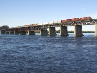 After holding for a boat passing through the St. Lawrence Seaway, CP 251 has a trio of ES44AC's (CP 8847, CP 8925 & CP 8805) as it approaches Montreal with a long train consisting of both mixed freight and intermodal traffic.