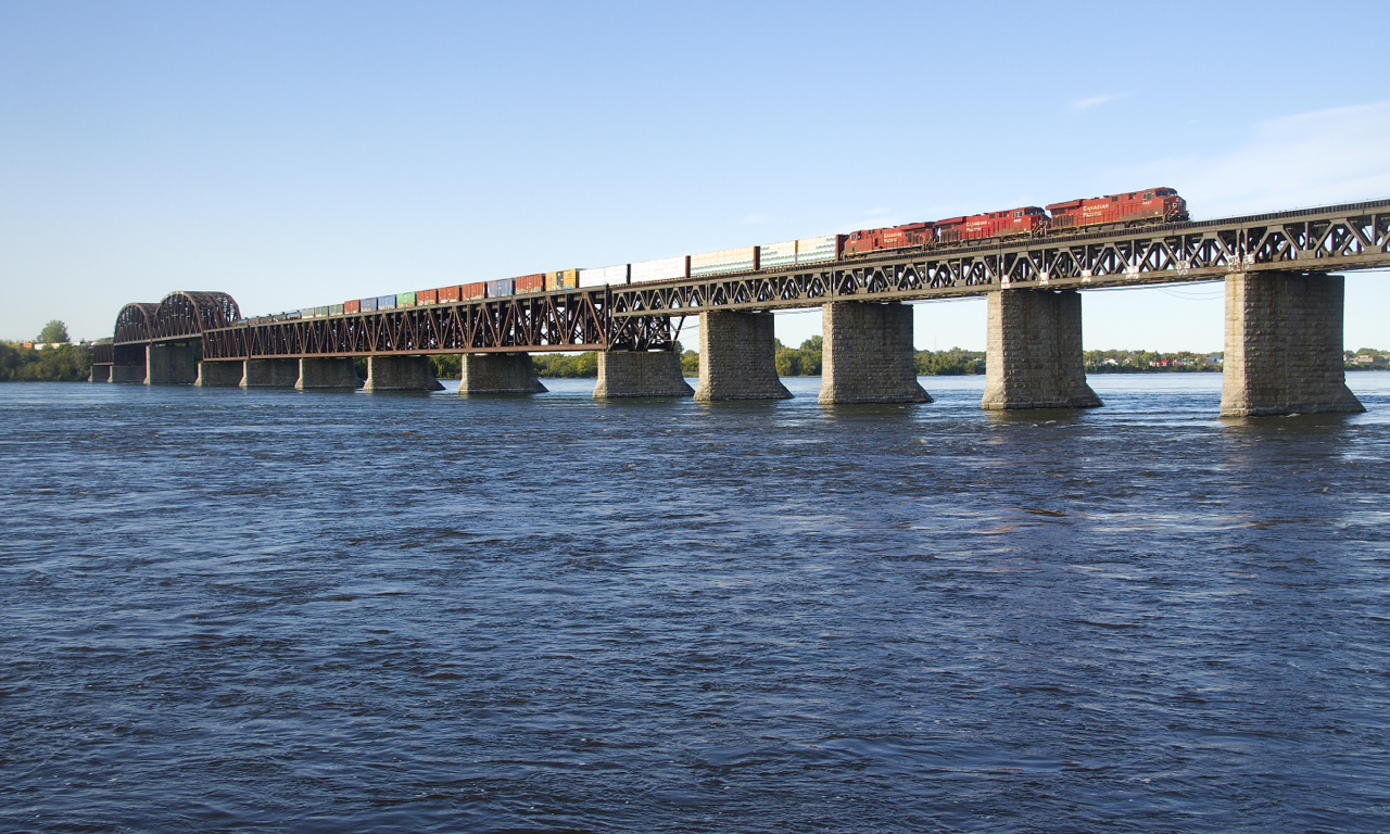 After holding for a boat passing through the St. Lawrence Seaway, CP 251 has a trio of ES44AC's (CP 8847, CP 8925 & CP 8805) as it approaches Montreal with a long train consisting of both mixed freight and intermodal traffic.