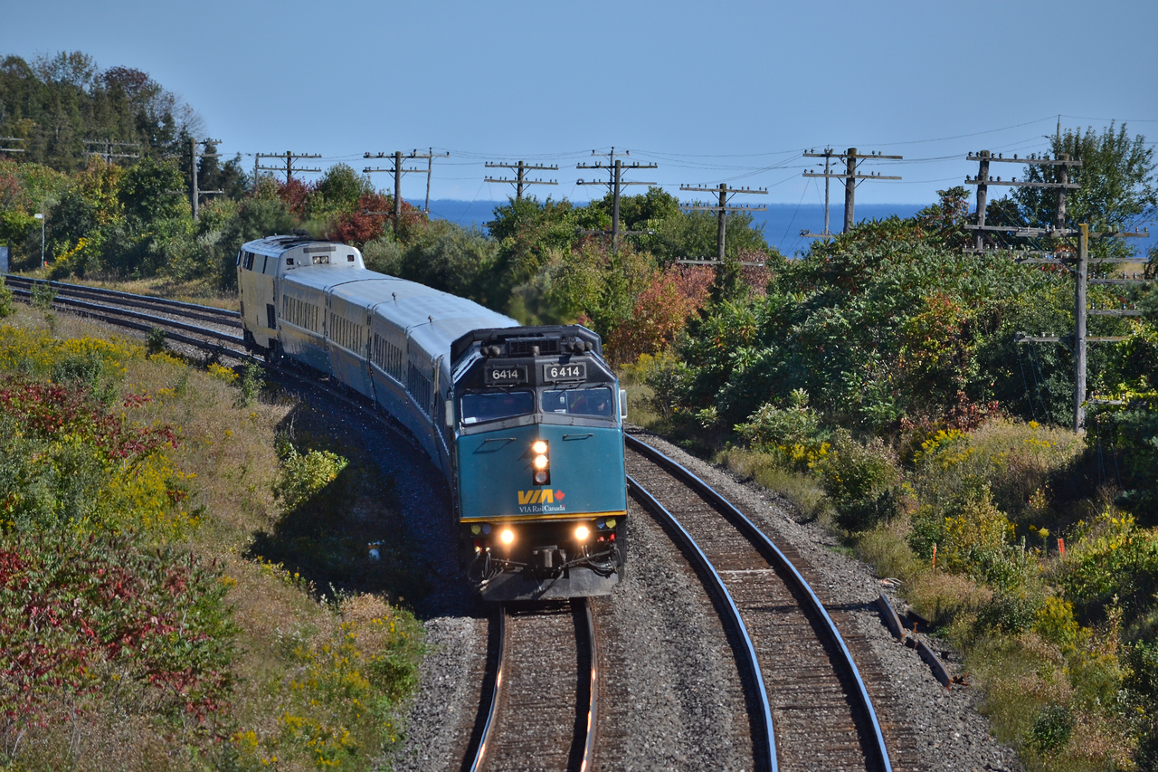 Via 6414 screams around the bend at Lovekin on a picture perfect day. Already Fall's colours are starting to show out East and with the cooler weather prevailing this week, more are bound to show soon.