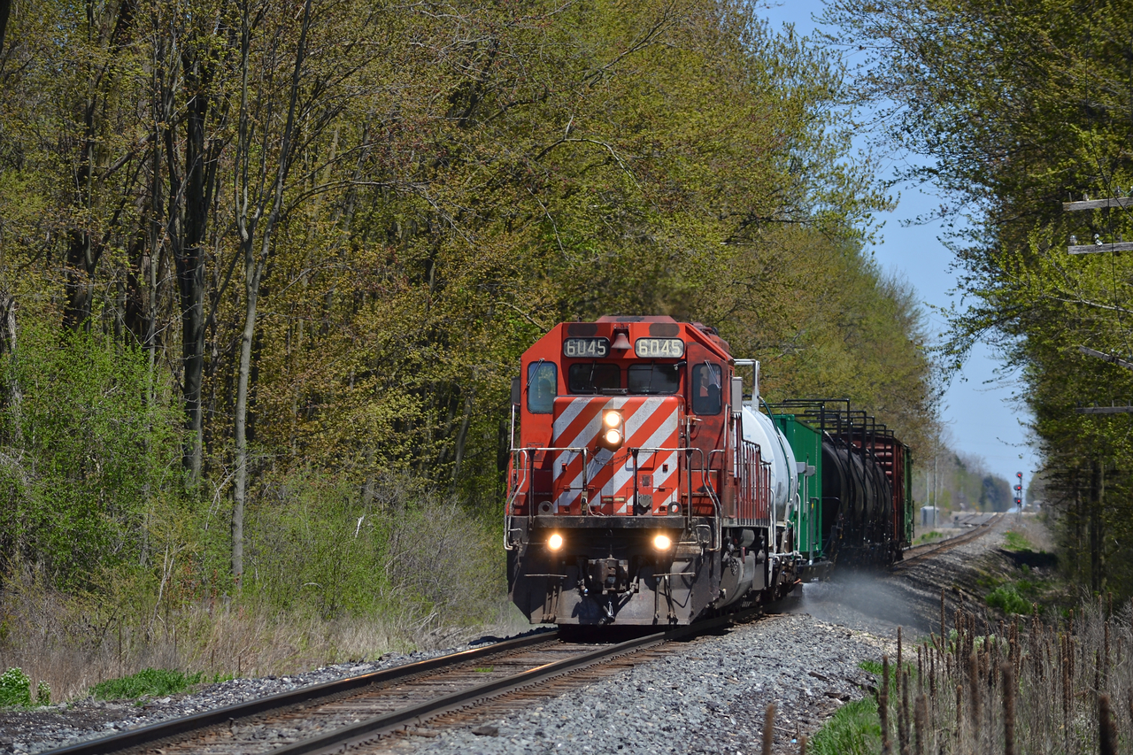 CP 6045 leads this years spray train down the Galt sub towards London, where after a quick crew change they continue to Windsor. 6045 put on an amazing chase this year, however a lot of the shots that I got were a " set up, get your shots and run like hell "