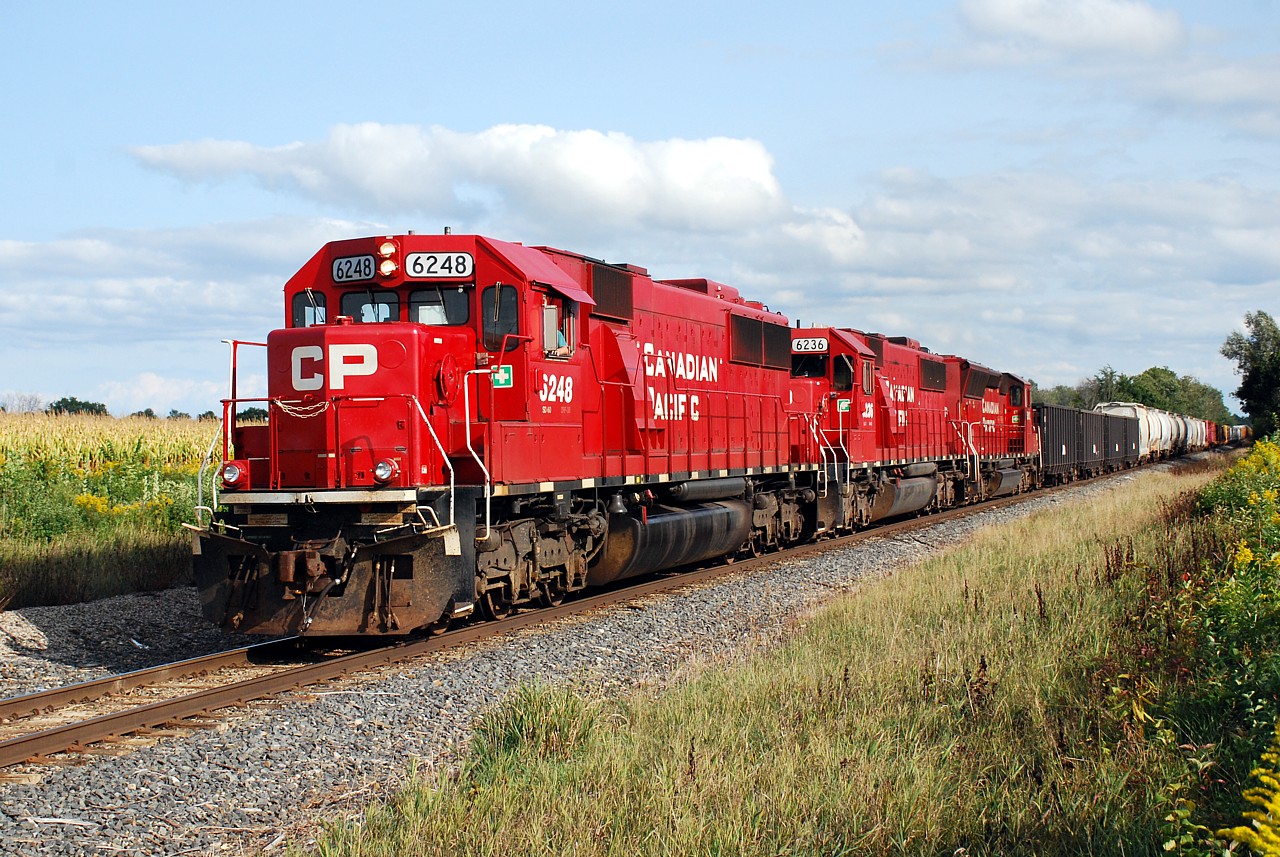 CP 254 and 255 continue to run back and forth between London and NS Bison Yard in Buffalo, NY with CP 6248, CP 6236 and CP 5012.  I'm still trying to get a decent shot of CP 5012 leading, which would have happened right here if the power hadn't been turned a week or so ago.  It usually doesn't.  CP 254 is seen in nice late-afternoon light approaching Concession Road 6 in Flamborough Centre.