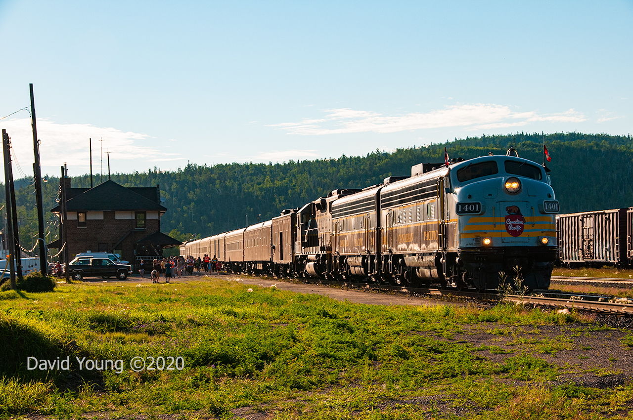 A warm July evening in Schreiber finds the "29B", dubbed locally as the "Superior Flyer" stopped at the station having completed an evening run west to Gravel and return. The crew reminisces over the radio of the old days when they would spot up the Canadian just like this while passengers disembark after an evening run to Gravel. Once the all clear is given, the train will proceed to tie down for the night in the yard. The following morning they will run east to Coldwell and return with another run west to Gravel in the evening and return. This was a 3 day excursion for CP employees based out of Schreiber, all organized for the 125th anniversary of the driving of the Last Spike.