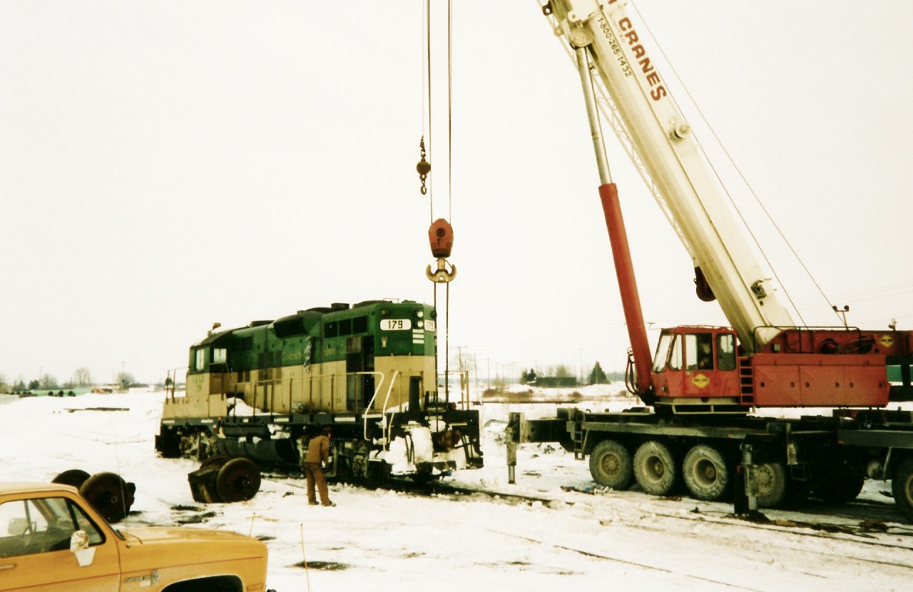 Goderich-Exeter Railway (GEXR) GP9 179 undergoes some emergency traction motor repairs near the location of the CN roundhouse at Stratford Yard.

The winter of 1993-1994 was a brutal one for GEXR's fleet of second-hand GP9’s and by early February, most were either out of service or severely ailing, which forced RailTex to lease power or transfer from their other operations.