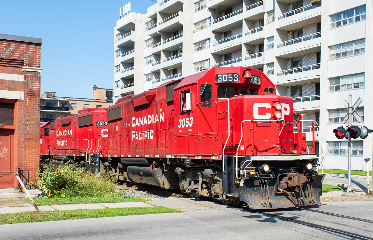 The crossing closest to Kinnear Yard is Cumberland Avenue, and that's the location for this photo, as CP TH11 makes its way back to Kinnear late on a Sunday afternoon, about nine hours into their shift.