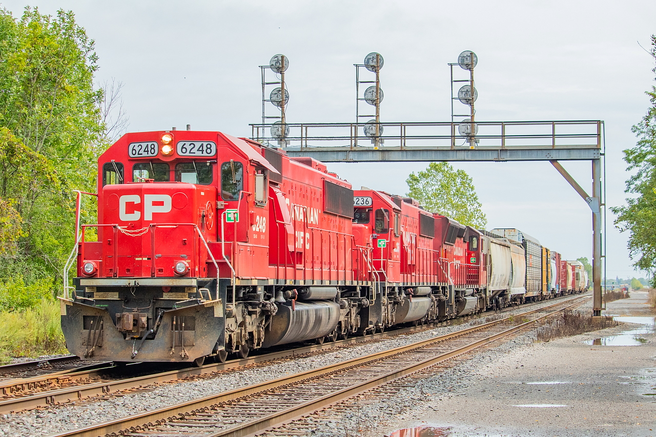 The three railways of Duff, Part 2: CP. Though this is CN trackage, CP typically sends more trains through here each day: 531/530 and 539/538 for CN, and 142/143 (though of late they have not been daily), 246/247 and one of 254/255 six days a week. After a morning of rain, the sun finally started to fight through the clouds in the early afternoon, in time for CP 255’s arrival into Canada.  Part 1 was CN (link here), and Part 3 is NS (link here).